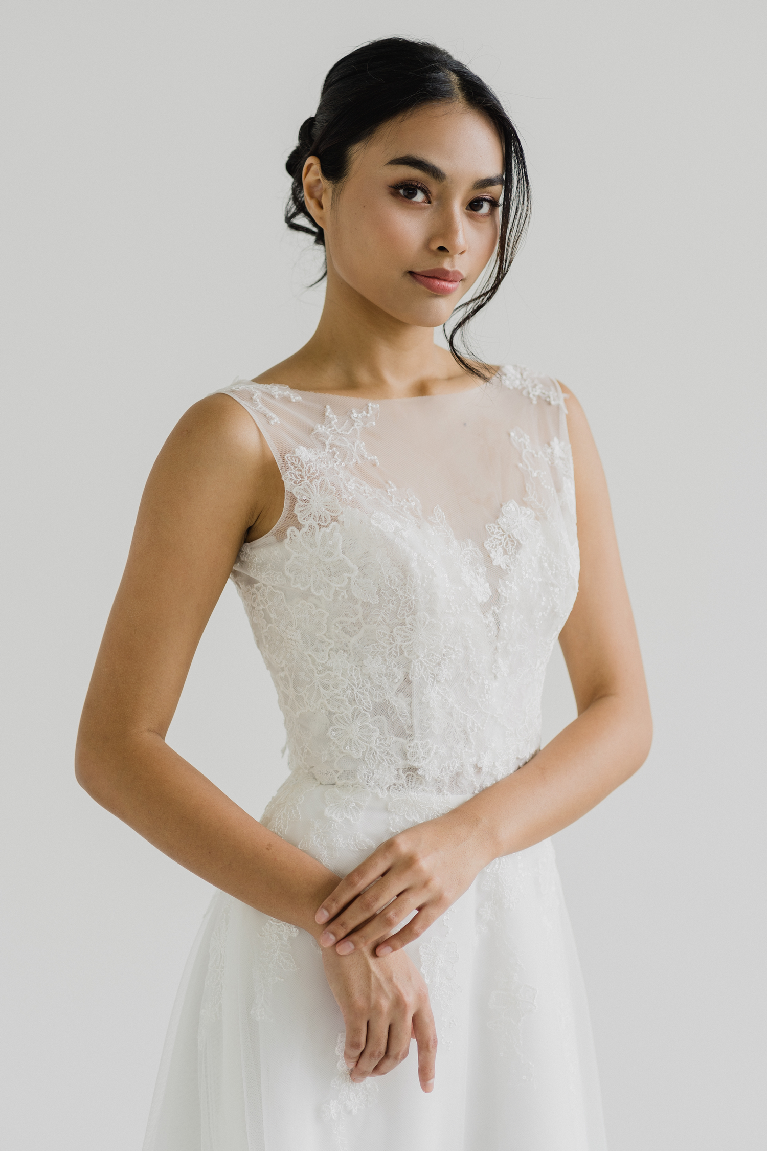 Valene wedding dress styled with a matching lace topper