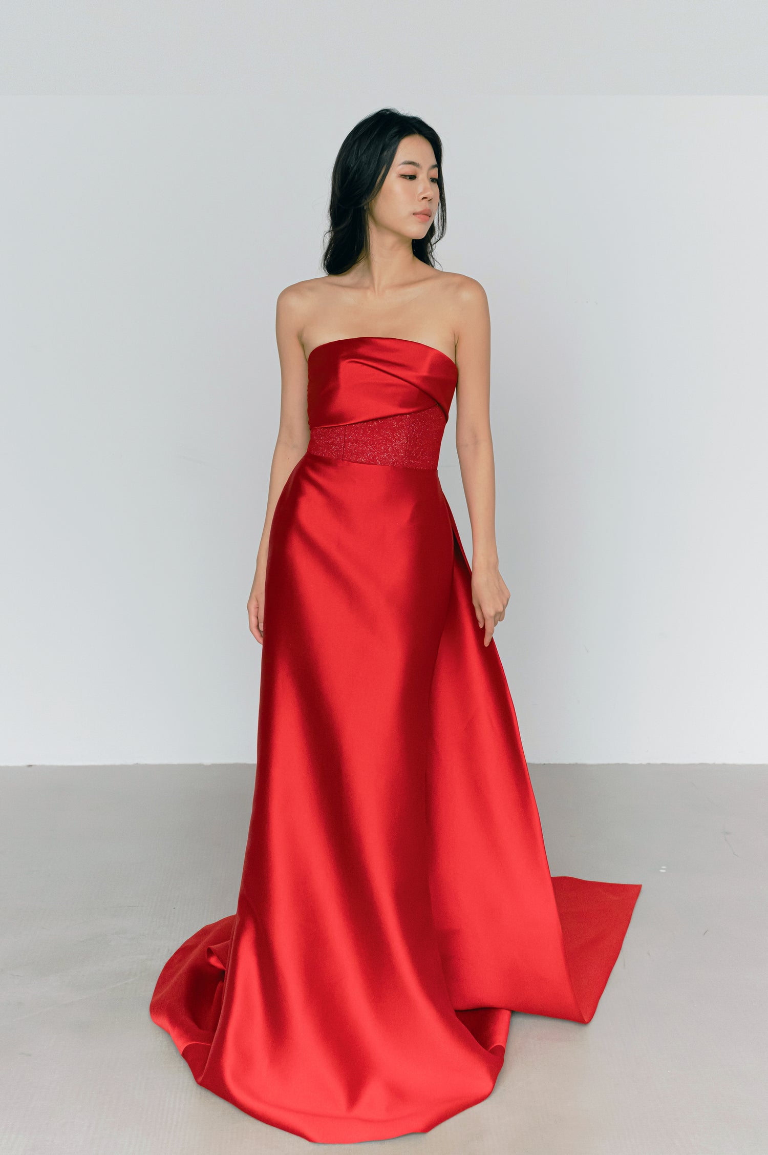 Valentina evening dress crafted from luxurious red satin with an elegant silhouette