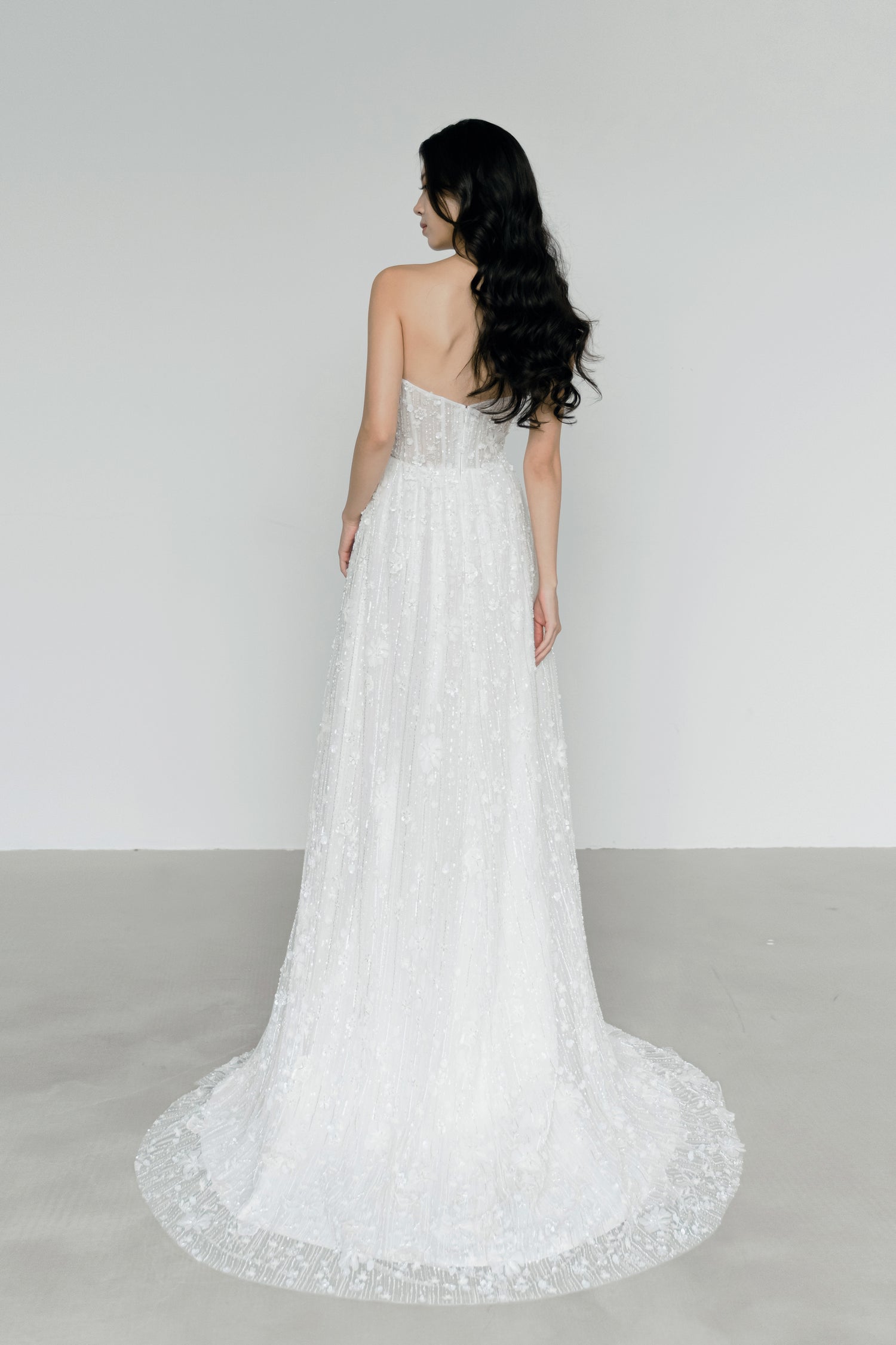 Venice bridal evening gown train showcasing the intricate beaded detailing and graceful train