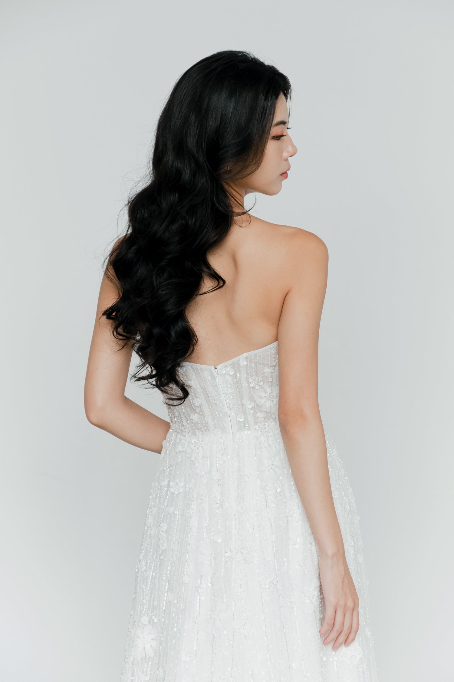 Venice evening dress back view with an elegant flowing silhouette