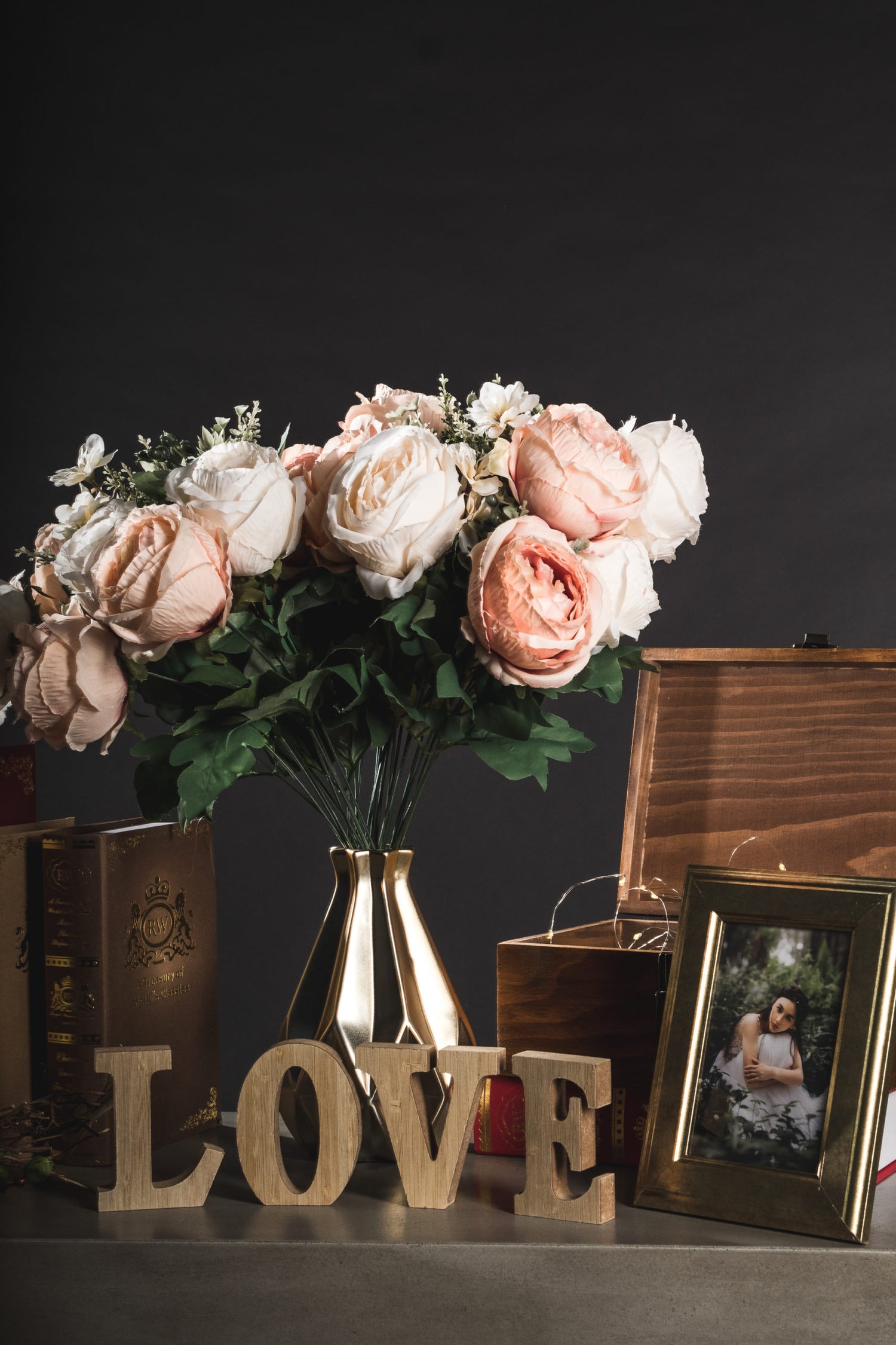 Close-up of Wedding Prop Set C showcasing rustic wooden décor and floral accents