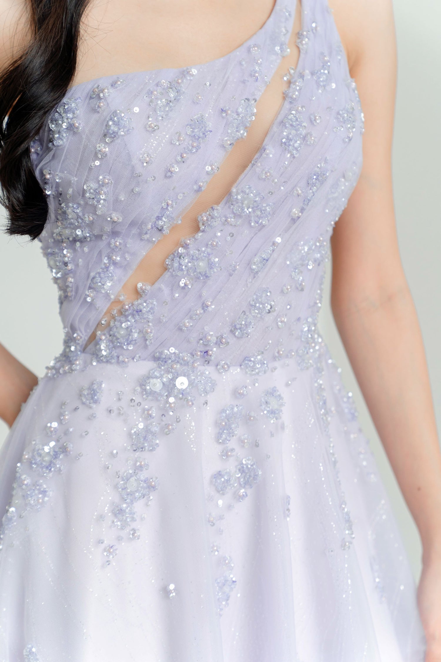 Close-up of Wisteria bridal evening gown showcasing the distinctive toga neckline