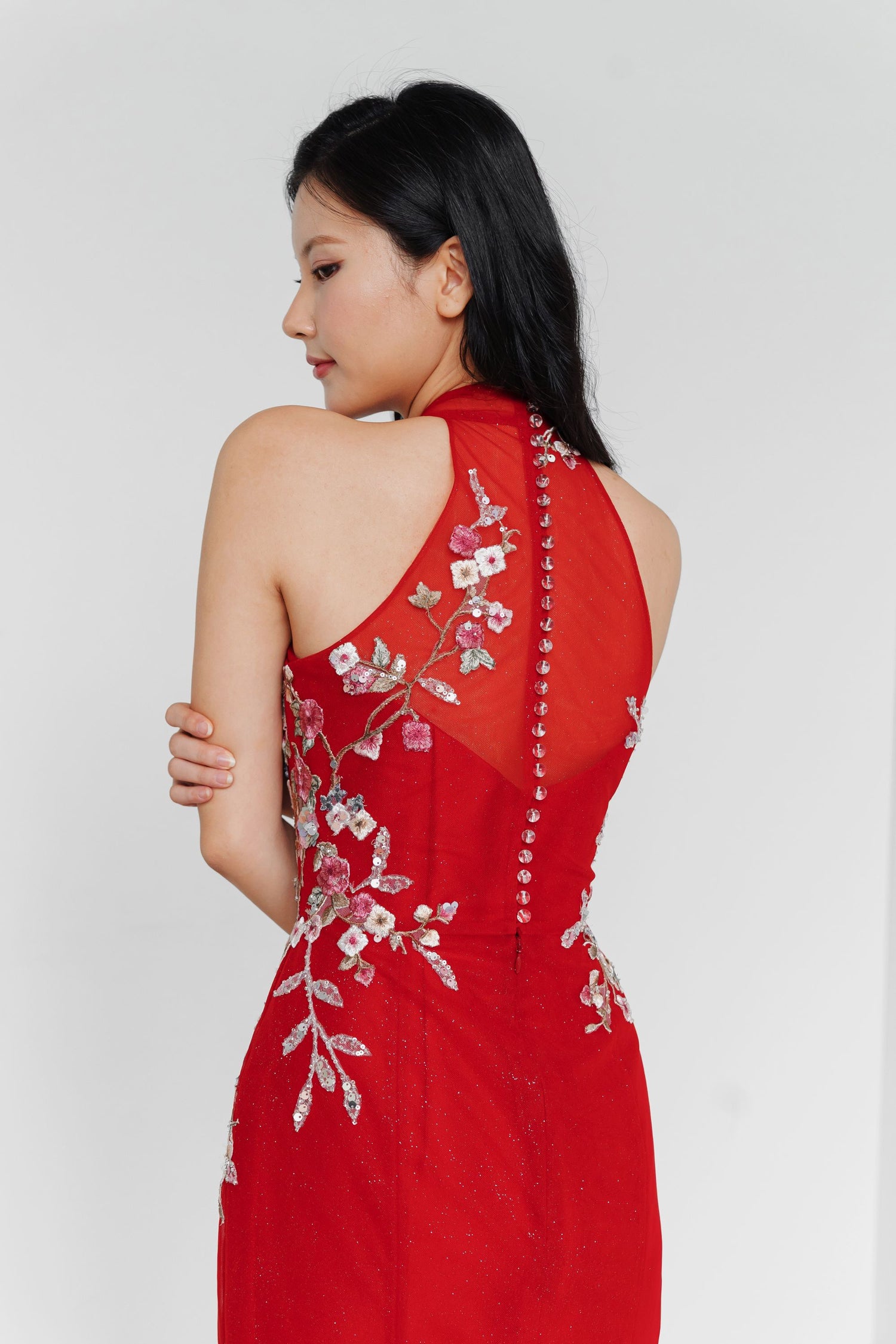 Close-up of Yasmin bridal cheongsam showcasing the detachable cheongsam-style overlay