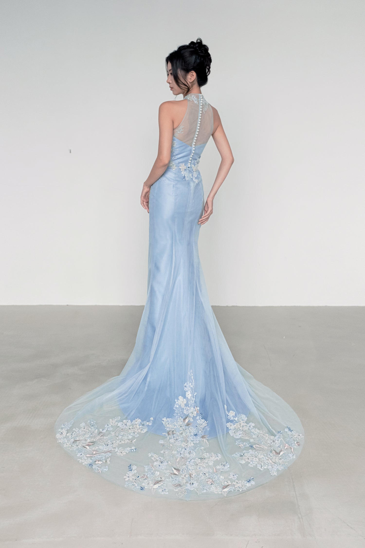 Yuka bridal evening gown train showcasing the intricate pastel lace detailing