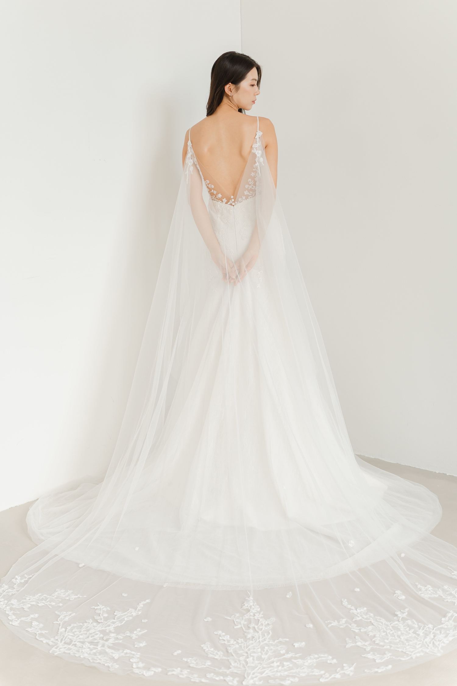 Yvonne bridal gown train showcasing delicate wildflower lace and a soft flowing train