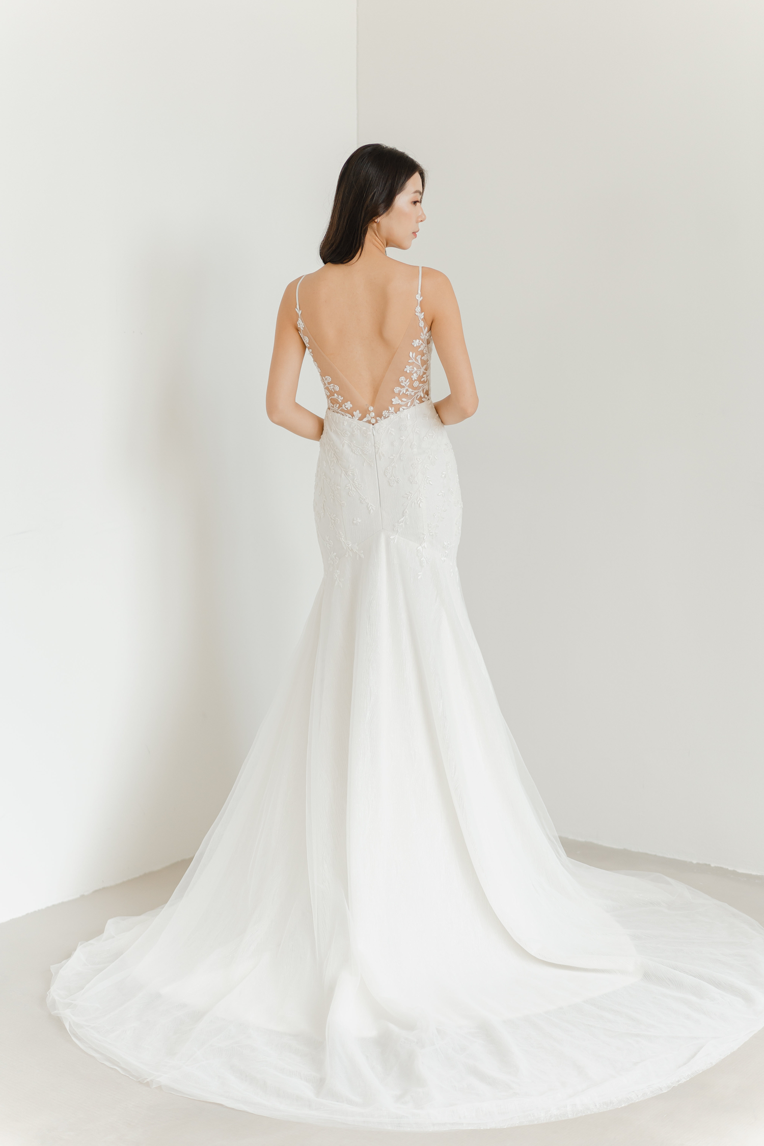 Yvonne wedding dress back view with an elegant fitted silhouette