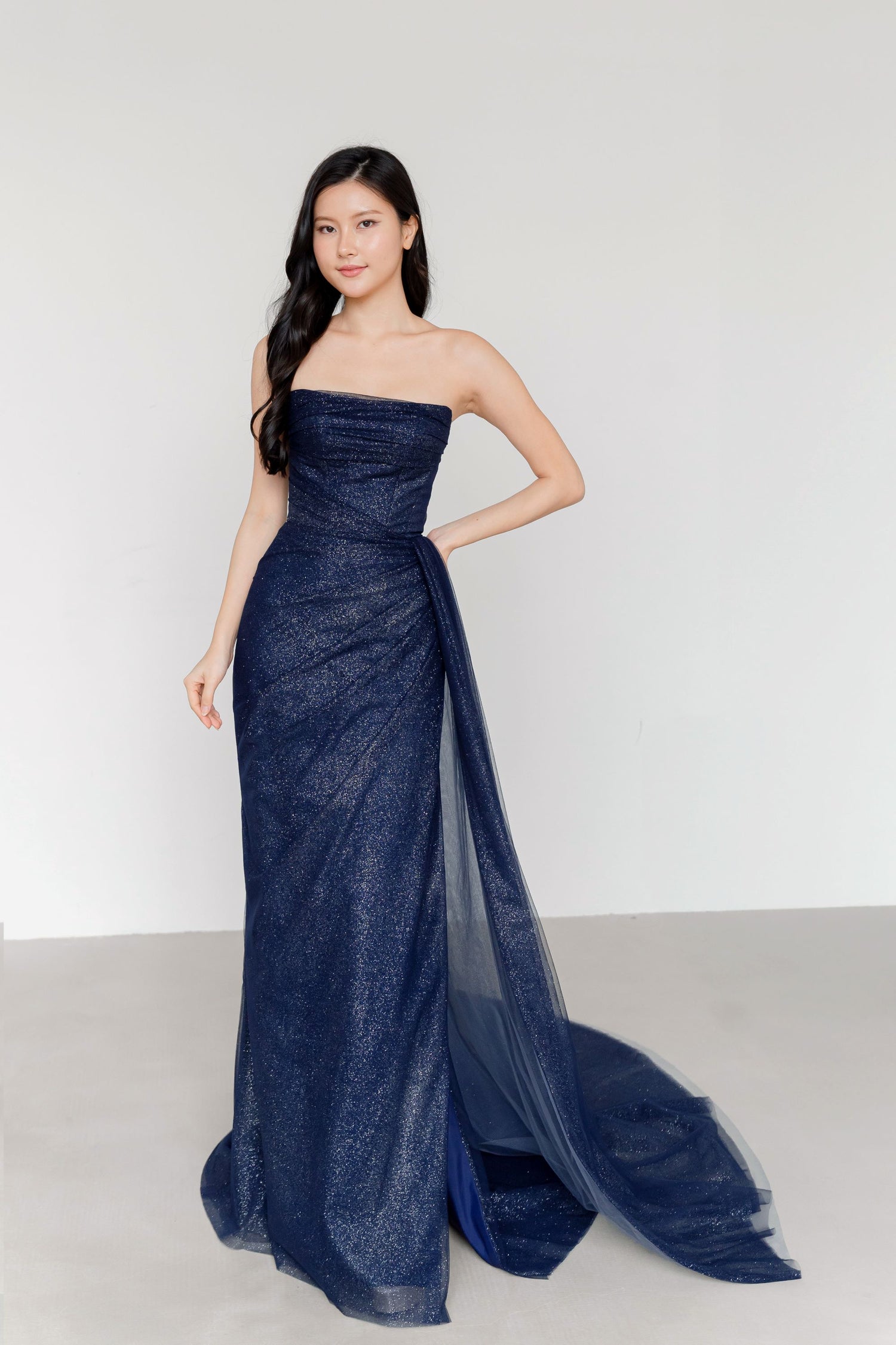 Zanda bridal evening gown front view in shimmering midnight blue glitter fabric